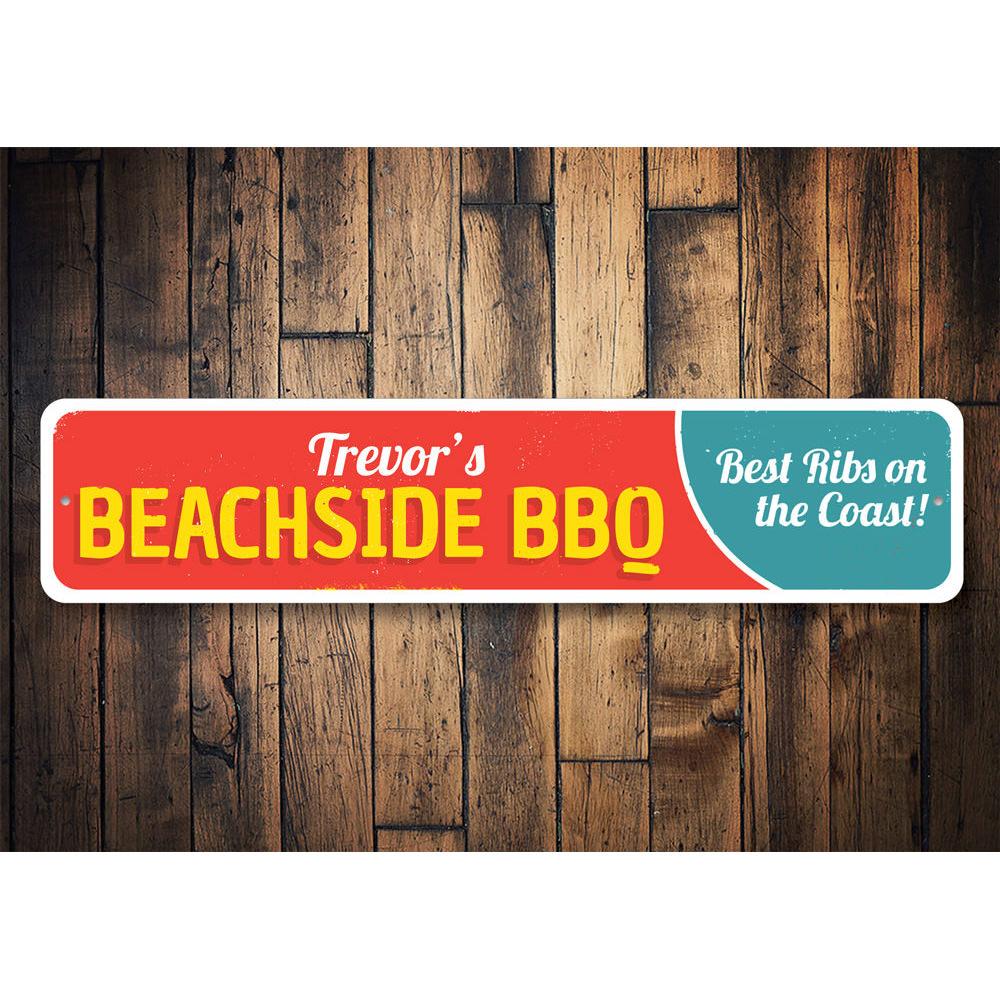 A vibrant Beachside BBQ Sign made of durable aluminum, featuring customizable text and pre-drilled holes for easy mounting, perfect for coastal decor.