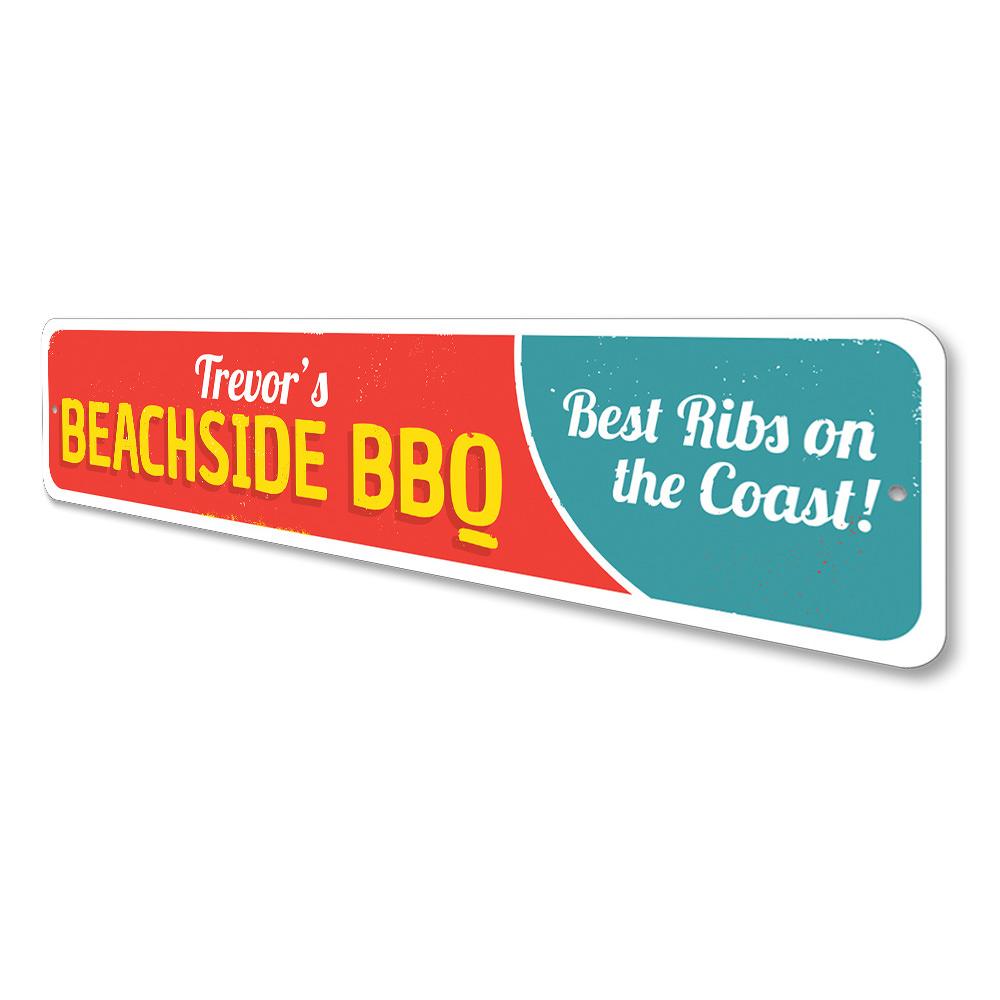 A vibrant Beachside BBQ Sign made of durable aluminum, featuring customizable text and pre-drilled holes for easy mounting, perfect for coastal decor.