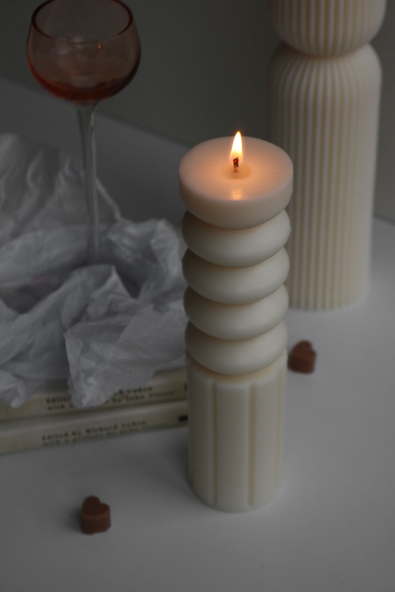 Elegant bead pillar candle made from soy wax blend, showcasing a sculptural design perfect for home decor.