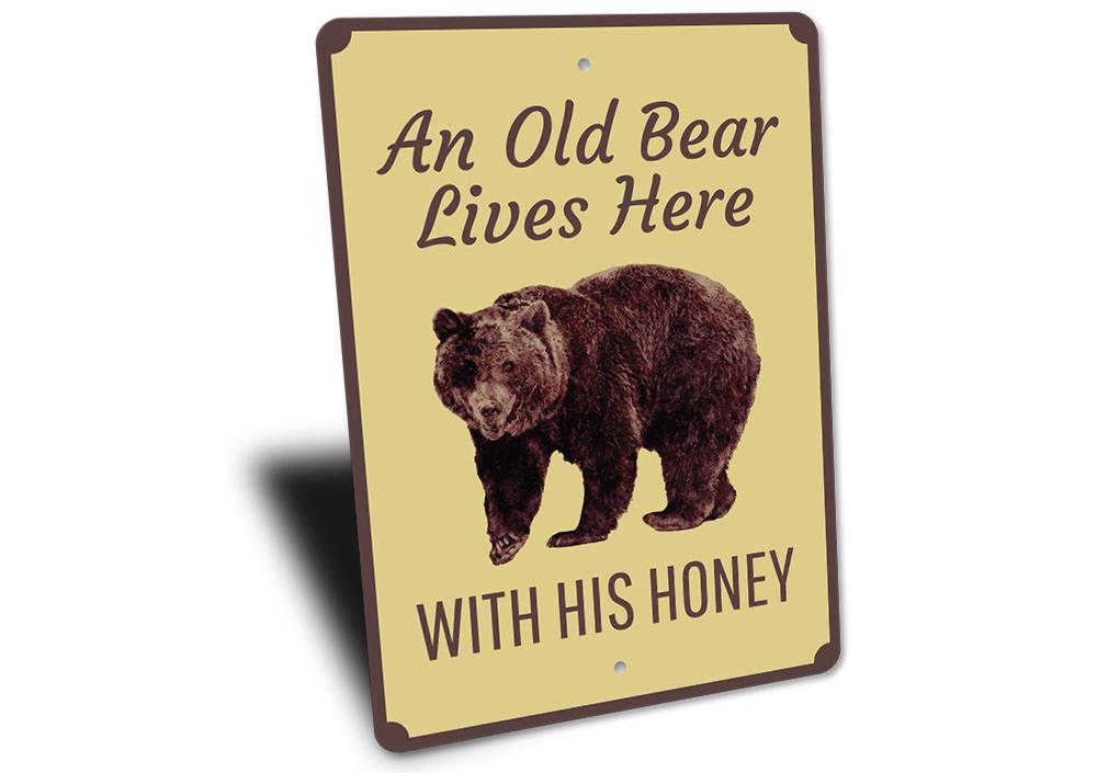 A decorative Bear Lover Sign made of high-quality aluminum, featuring a bear design, perfect for lakehouse decor.