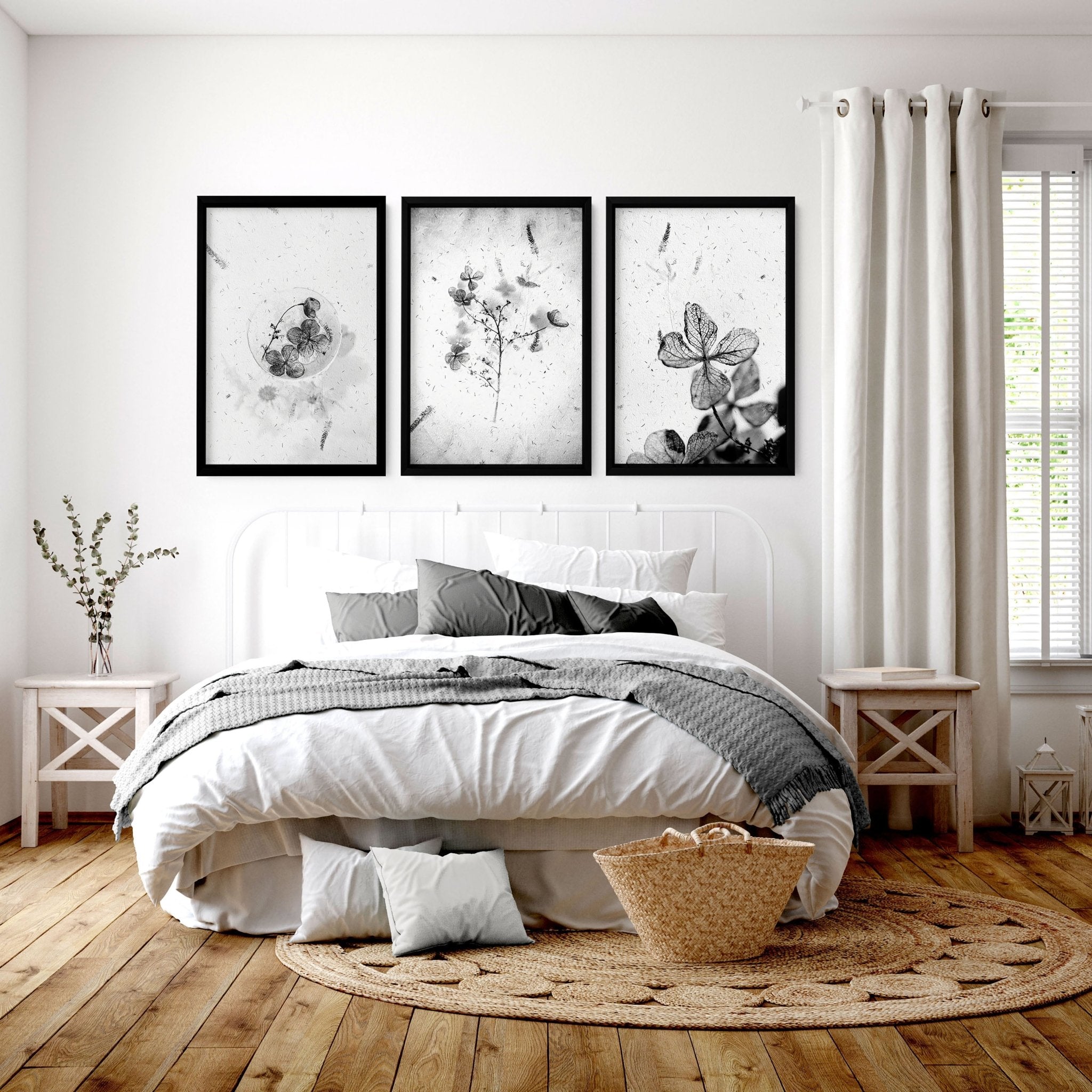 Set of 3 framed wall art prints featuring Greyscale Dry Floral Botanicals, elegantly displayed for bedroom decor.