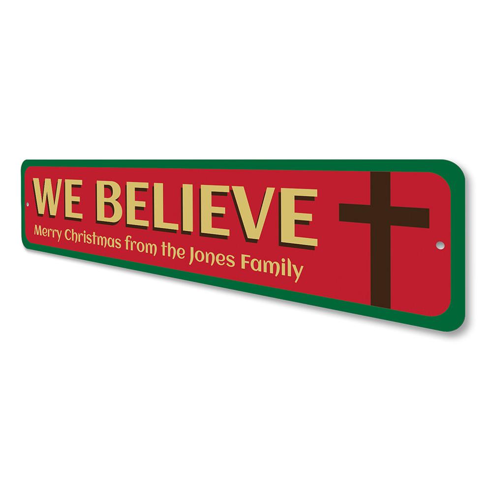 Believe Cross Sign featuring a festive design, made of high-quality aluminum, perfect for holiday decorations.