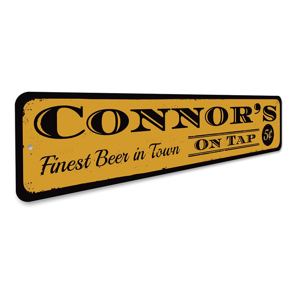 A decorative Beer On Tap Sign made of high-quality aluminum, featuring customizable text and pre-drilled holes for easy mounting.