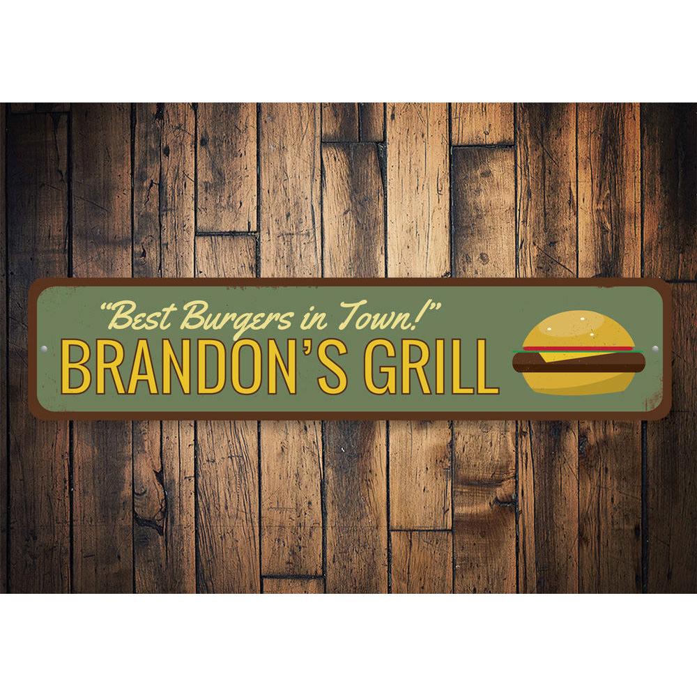 A decorative aluminum sign reading 'Best Burgers in Town', featuring vibrant colors and a stylish design, perfect for restaurants and cafes.