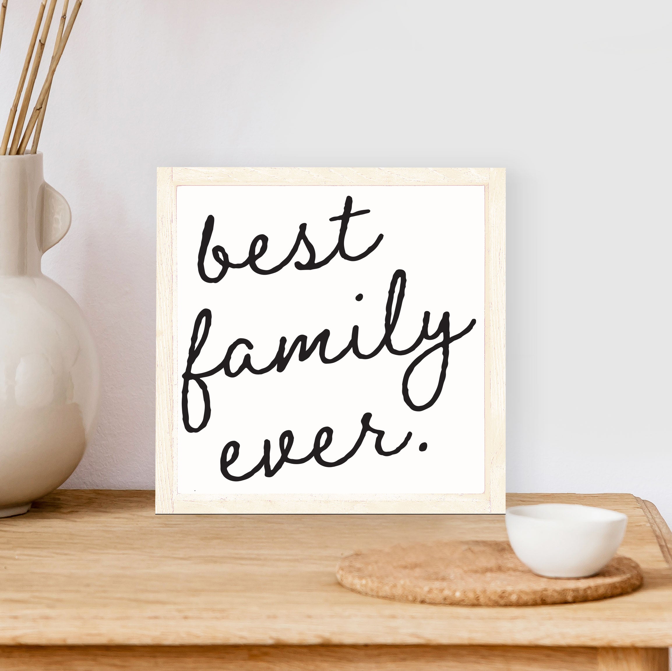 Best Family Ever Wood Sign with a rustic pine frame and waterproof black text on a white background, measuring 8x8 inches.