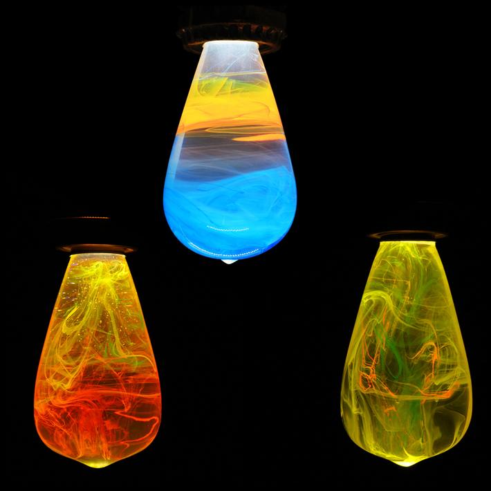 Best Seller Bundle featuring three eco-friendly LED bulbs in mixed colors, handcrafted with resin and beech wood.