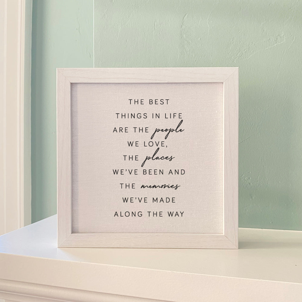 Framed sign featuring the phrase 'Best Things in Life' with a stylish wood frame, available in walnut or white-washed finish.