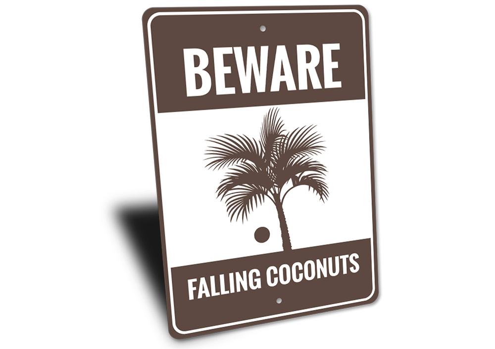 Beware Falling Coconuts Sign made of high-quality aluminum, featuring a playful design perfect for beach houses and coastal decor.