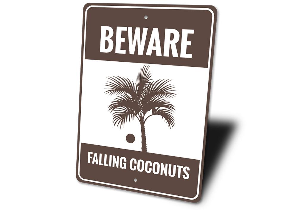 Beware Falling Coconuts Sign made of high-quality aluminum, featuring a playful design perfect for beach houses and coastal decor.