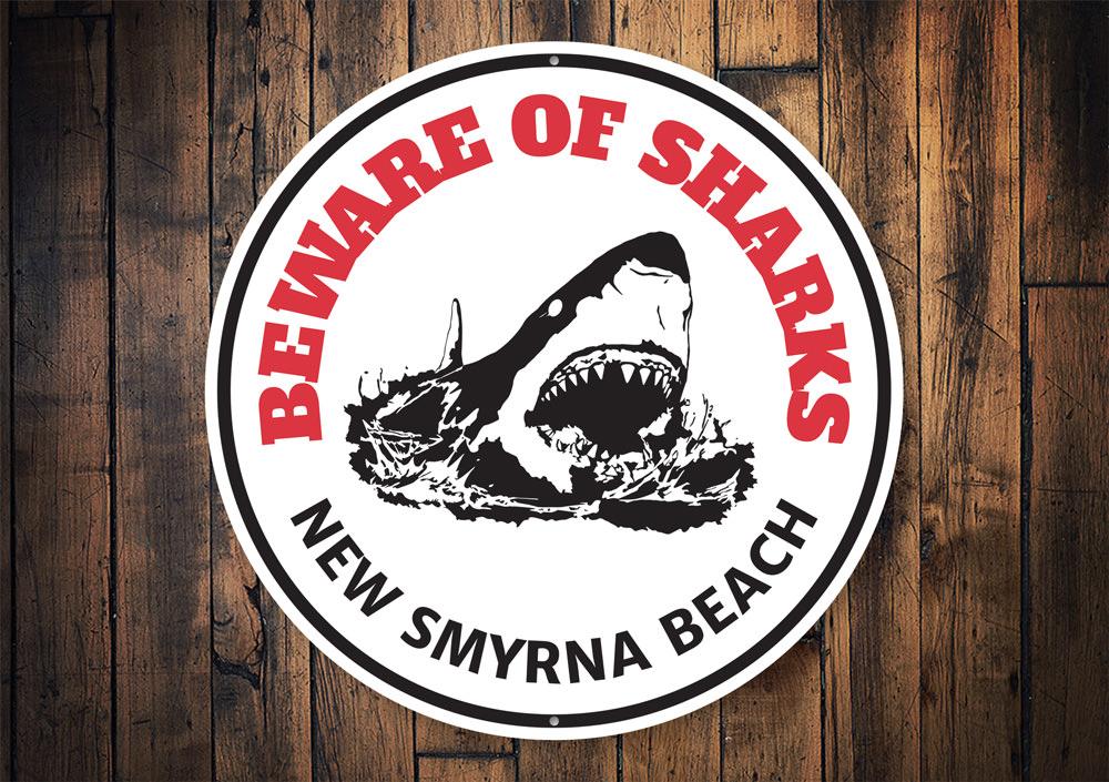 Beware of Sharks Beach Sign made of durable aluminum, featuring vibrant colors and a playful design, perfect for coastal decor.