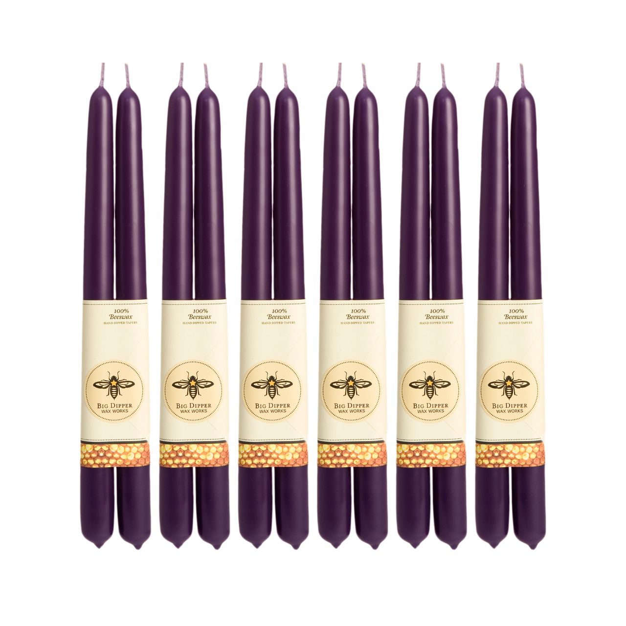 A pair of elegant Big Dipper Wax Works 100% Pure Beeswax STANDARD Tapers, hand-dipped and showcasing a warm golden hue.