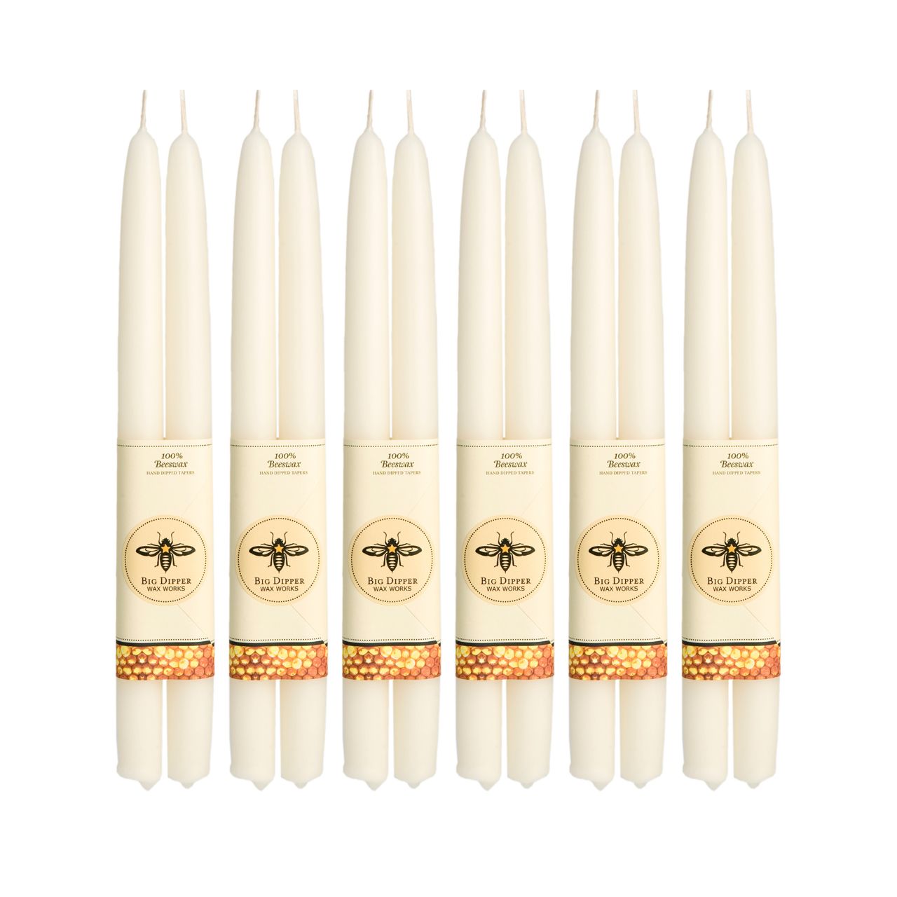 A pair of elegant Big Dipper Wax Works 100% Pure Beeswax STANDARD Tapers, hand-dipped and showcasing a warm golden hue.