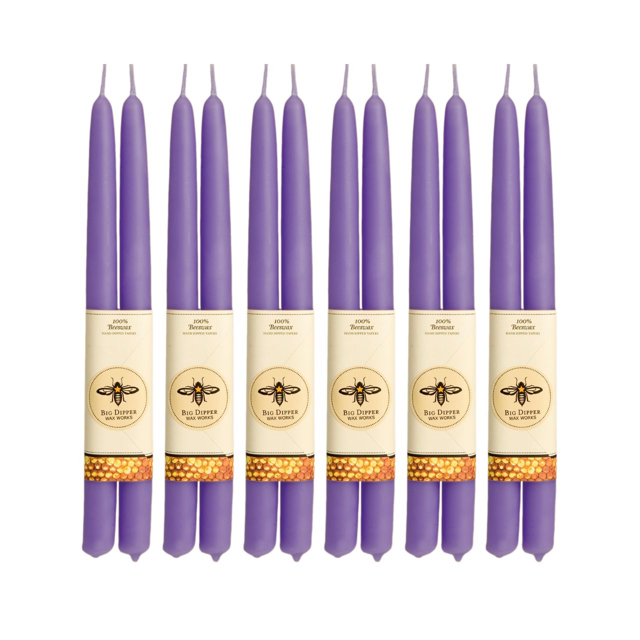 A pair of elegant Big Dipper Wax Works 100% Pure Beeswax STANDARD Tapers, hand-dipped and showcasing a warm golden hue.