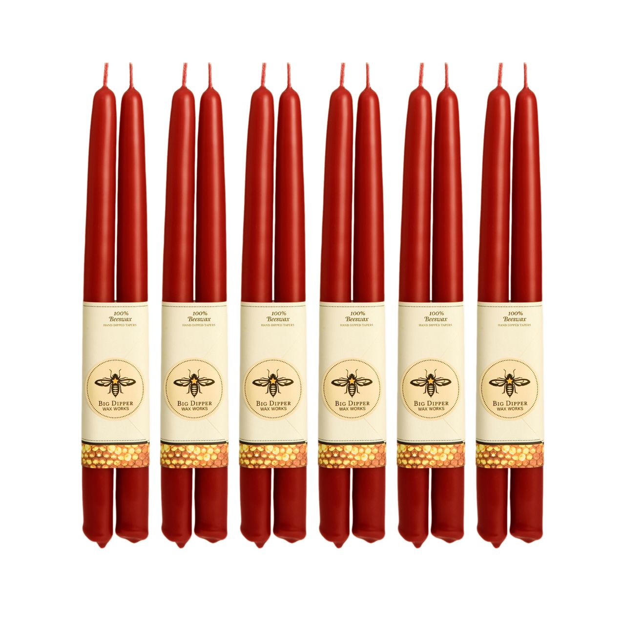 A pair of elegant Big Dipper Wax Works 100% Pure Beeswax STANDARD Tapers, hand-dipped and showcasing a warm golden hue.