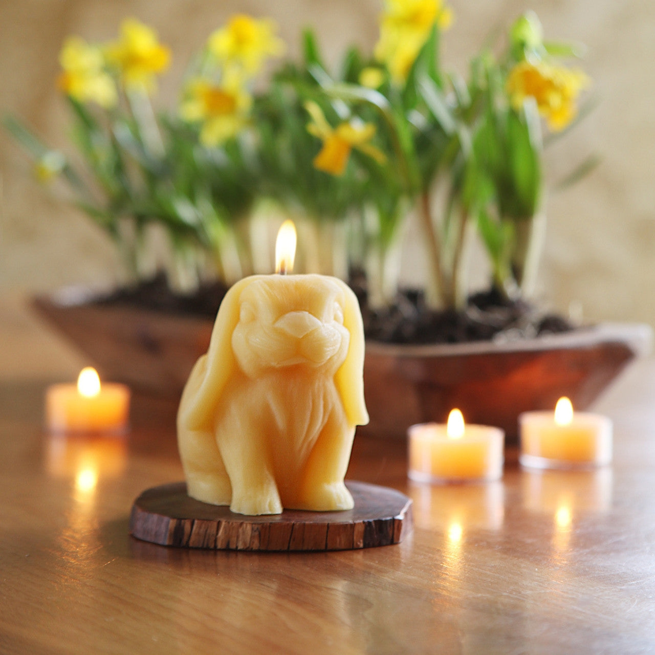 A charming Big Dipper Wax Works Beeswax Bunny Candle, hand sculpted, featuring a cute bunny design in natural beeswax color, perfect for Spring decor.