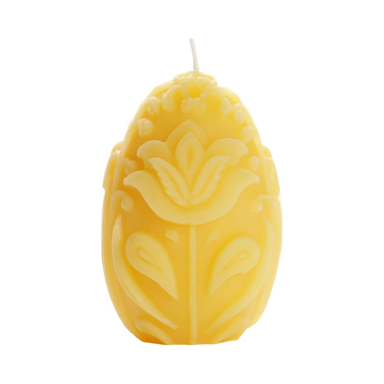 A beautifully crafted 3.5-inch tall beeswax egg pillar candle with an intricate floral design, glowing softly.