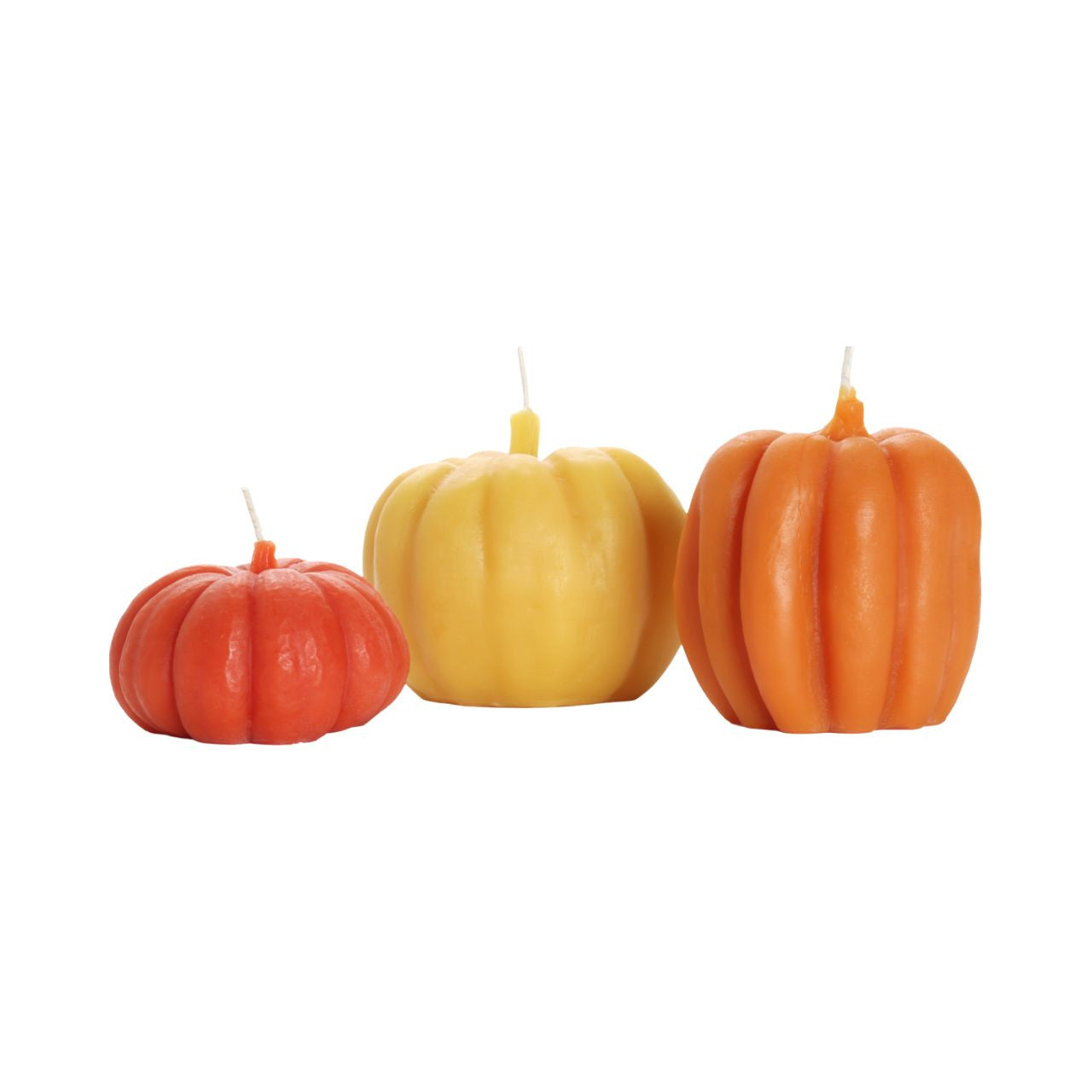 Three handcrafted beeswax pumpkin candles in dark orange, light orange, and natural colors, showcasing their unique designs and warm glow.