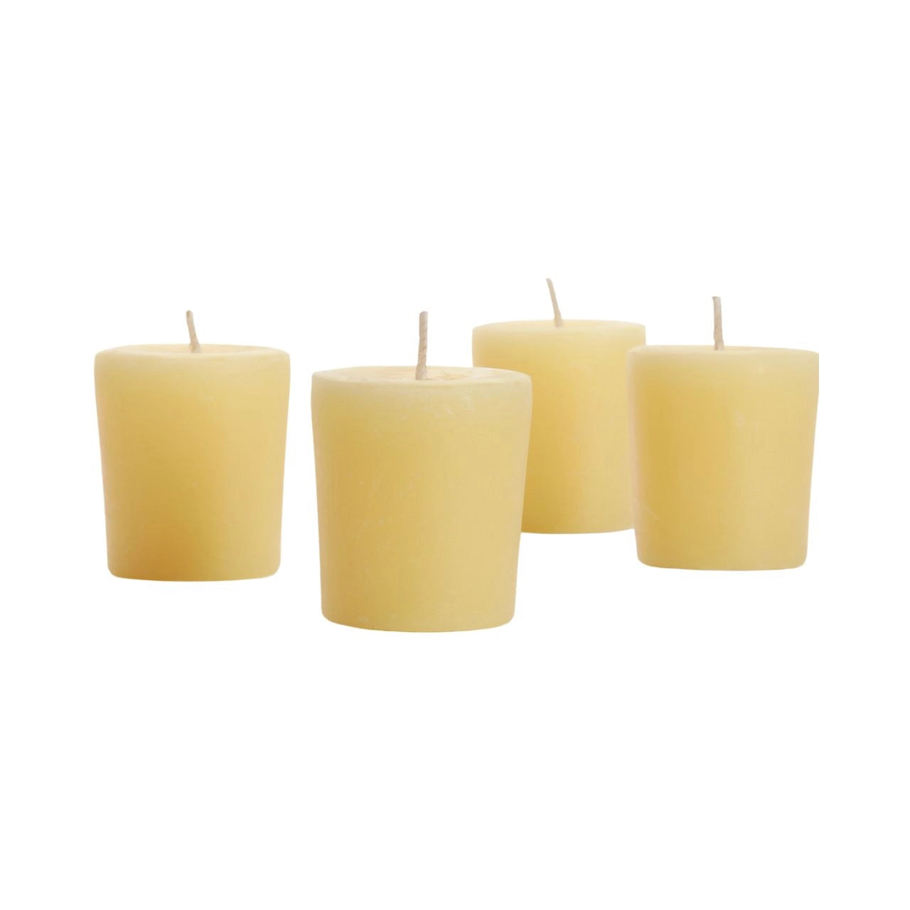 Big Dipper Wax Works Citronella Votives in a decorative glass, showcasing their warm glow and natural citronella oil.