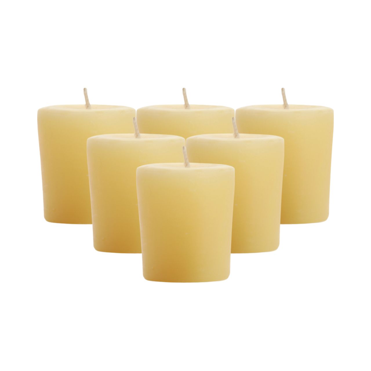 Big Dipper Wax Works Citronella Votives in a decorative glass, showcasing their warm glow and natural citronella oil.