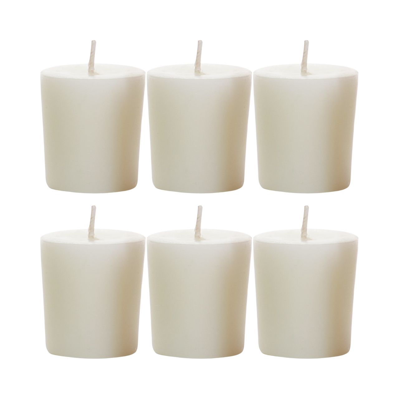 Big Dipper Wax Works Holiday Aromatherapy Votives in festive colors, showcasing pine, mint, and spice scents, perfect for holiday ambiance.