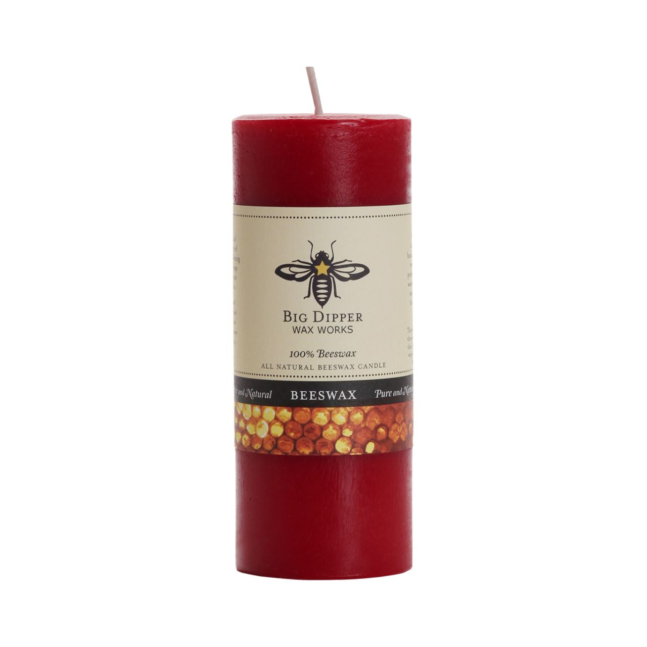 Big Dipper Wax Works Pure Beeswax Pillars in various sizes and colors, showcasing their elegant design and natural honey fragrance.