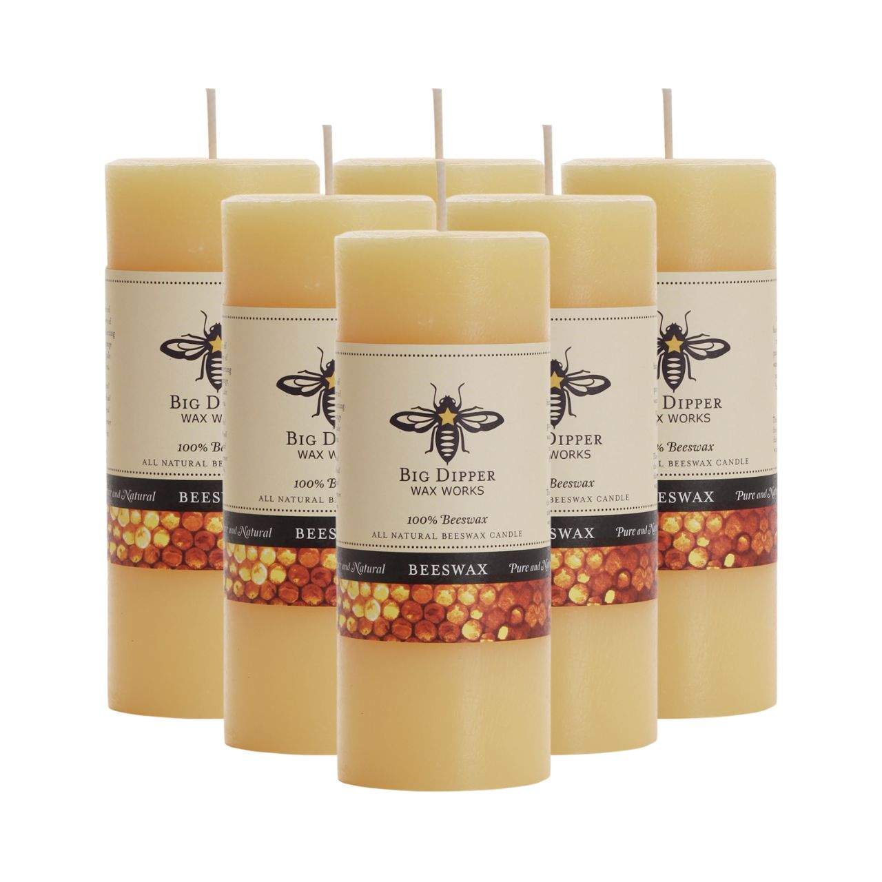 Big Dipper Wax Works Pure Beeswax Pillars in various sizes and colors, showcasing their elegant design and natural honey fragrance.