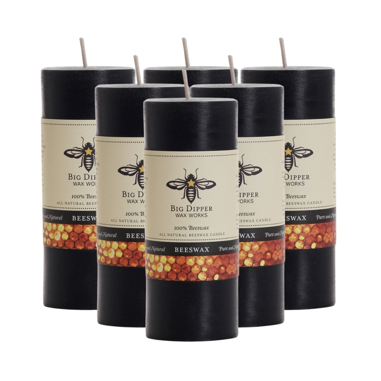 Big Dipper Wax Works Pure Beeswax Pillars in various sizes and colors, showcasing their elegant design and natural honey fragrance.