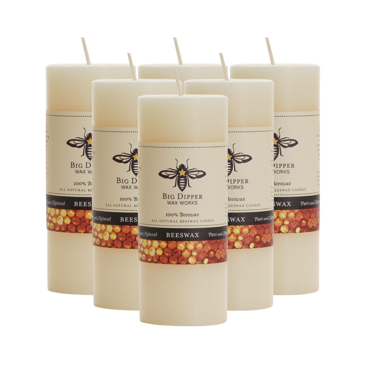 Big Dipper Wax Works Pure Beeswax Pillars in various sizes and colors, showcasing their elegant design and natural honey fragrance.