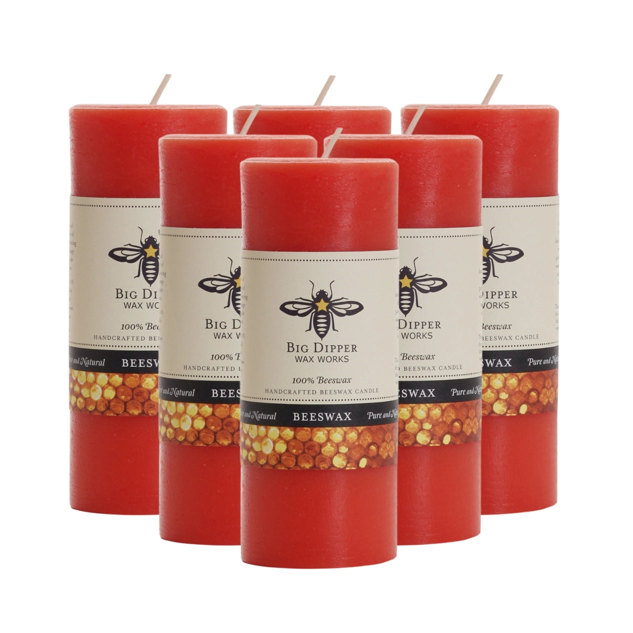 Big Dipper Wax Works Pure Beeswax Pillars in various sizes and colors, showcasing their elegant design and natural honey fragrance.