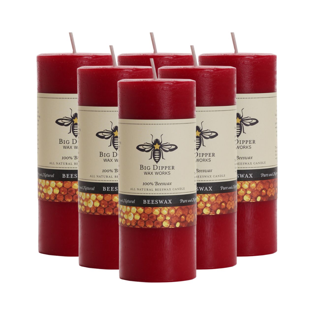 Big Dipper Wax Works Pure Beeswax Pillars in various sizes and colors, showcasing their elegant design and natural honey fragrance.