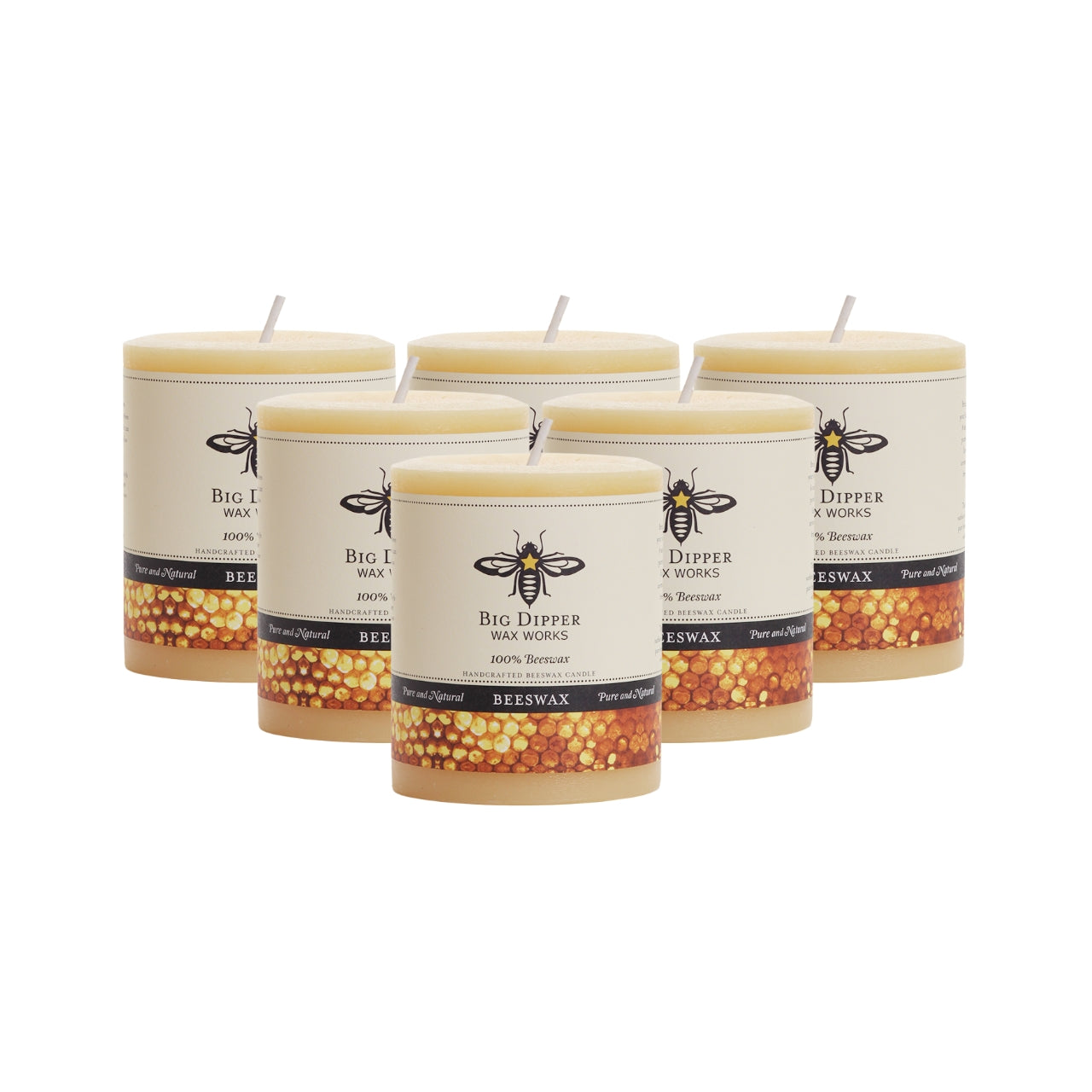 Big Dipper Wax Works Pure Beeswax Pillars in various sizes and colors, showcasing their elegant design and natural honey fragrance.