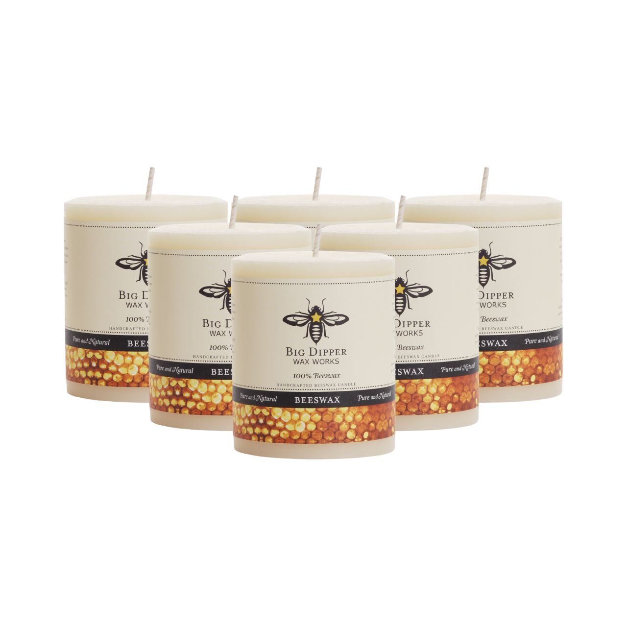 Big Dipper Wax Works Pure Beeswax Pillars in various sizes and colors, showcasing their elegant design and natural honey fragrance.