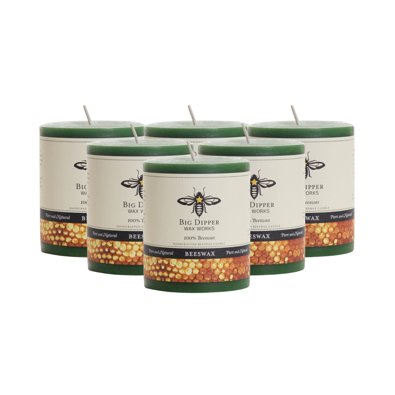 Big Dipper Wax Works Pure Beeswax Pillars in various sizes and colors, showcasing their elegant design and natural honey fragrance.