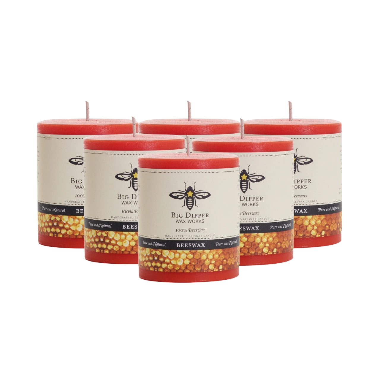 Big Dipper Wax Works Pure Beeswax Pillars in various sizes and colors, showcasing their elegant design and natural honey fragrance.