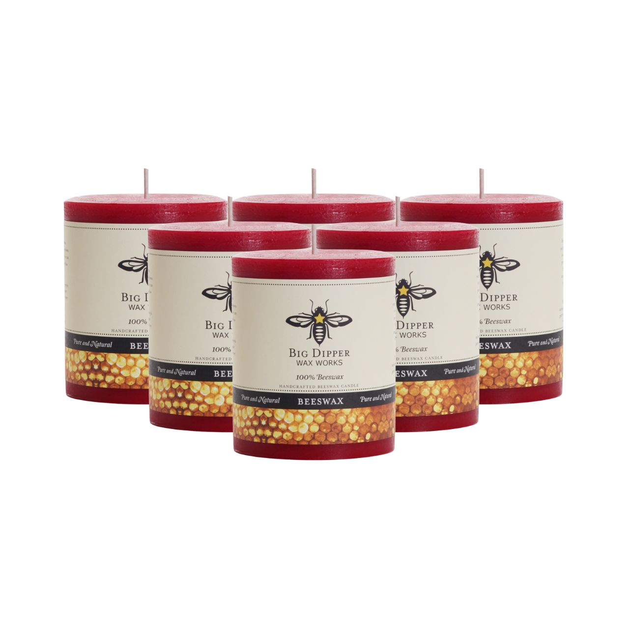 Big Dipper Wax Works Pure Beeswax Pillars in various sizes and colors, showcasing their elegant design and natural honey fragrance.