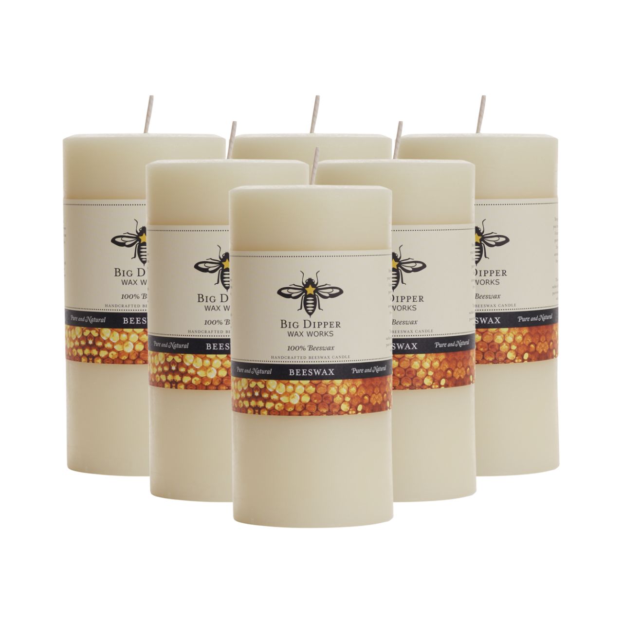 Big Dipper Wax Works Pure Beeswax Pillars in various sizes and colors, showcasing their elegant design and natural honey fragrance.