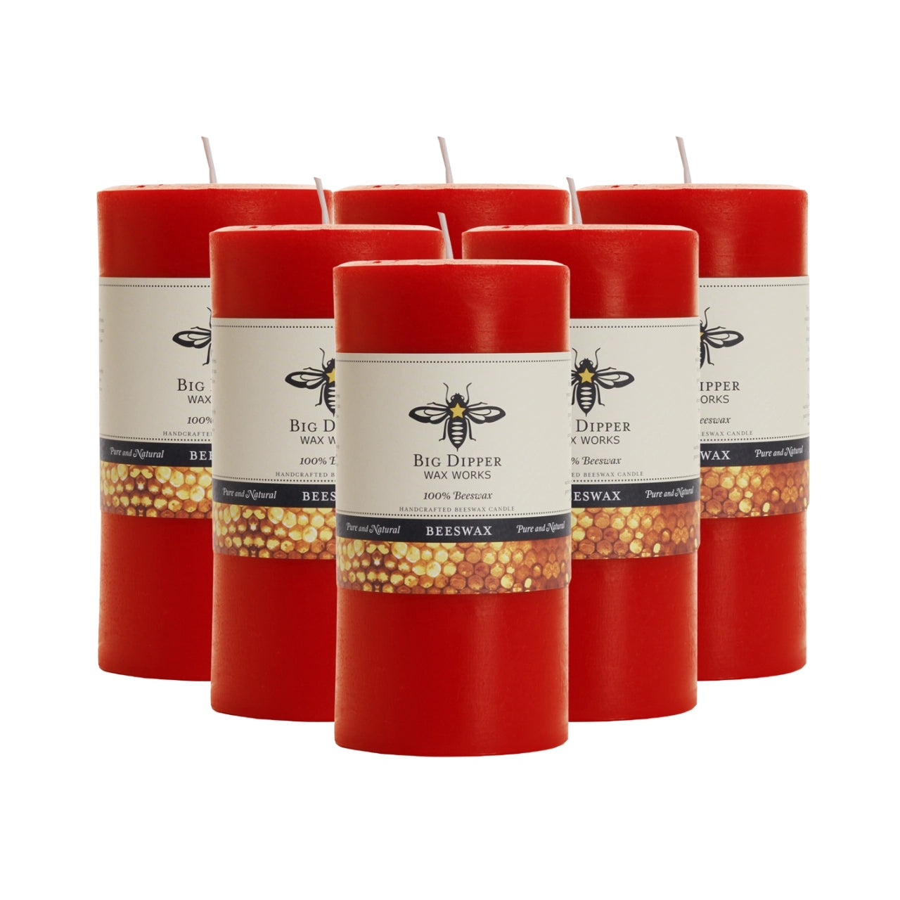 Big Dipper Wax Works Pure Beeswax Pillars in various sizes and colors, showcasing their elegant design and natural honey fragrance.