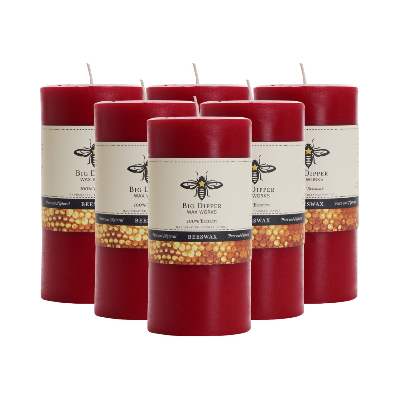 Big Dipper Wax Works Pure Beeswax Pillars in various sizes and colors, showcasing their elegant design and natural honey fragrance.