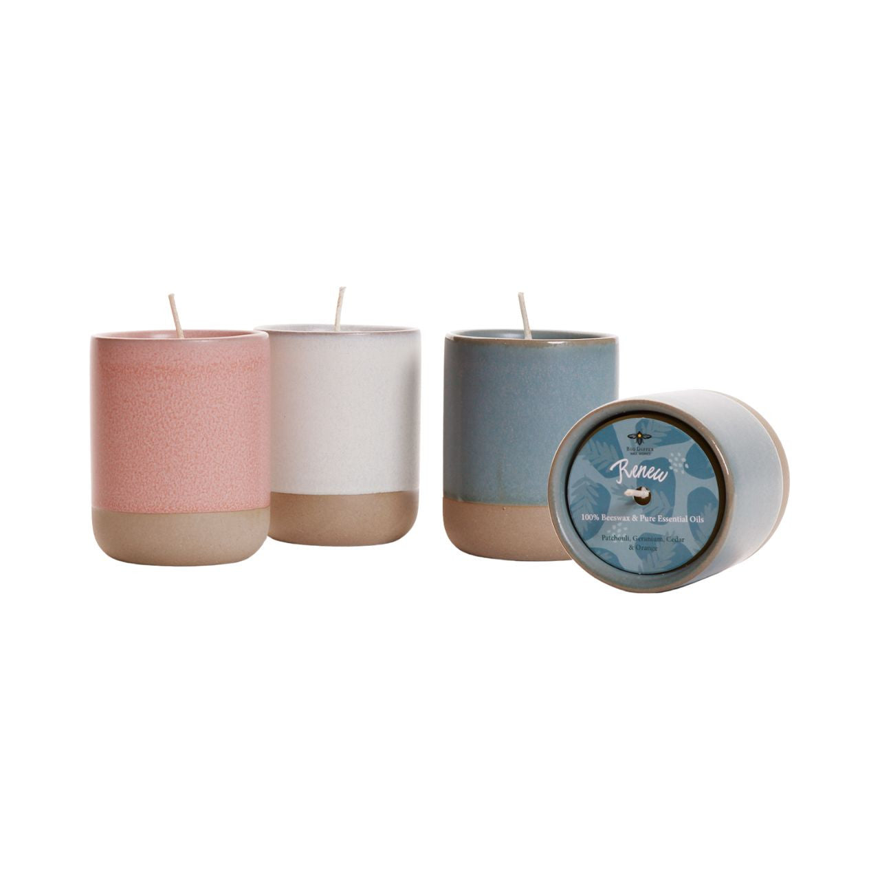 Big Dipper Wax Works Tranquility Stoneware Collection featuring three handcrafted vessels in muted colors with essential oils.