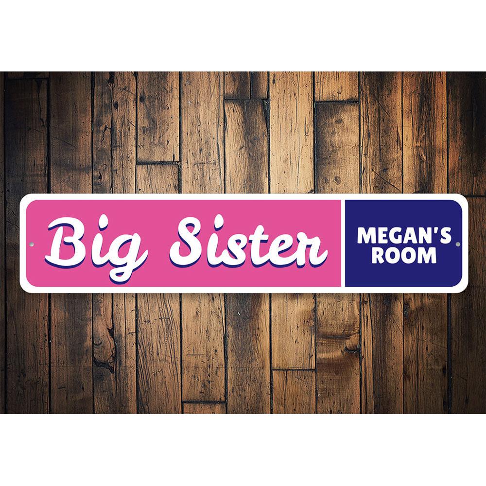 A decorative Big Sister Sign made of high-quality aluminum, featuring customizable text and pre-drilled holes for easy mounting.