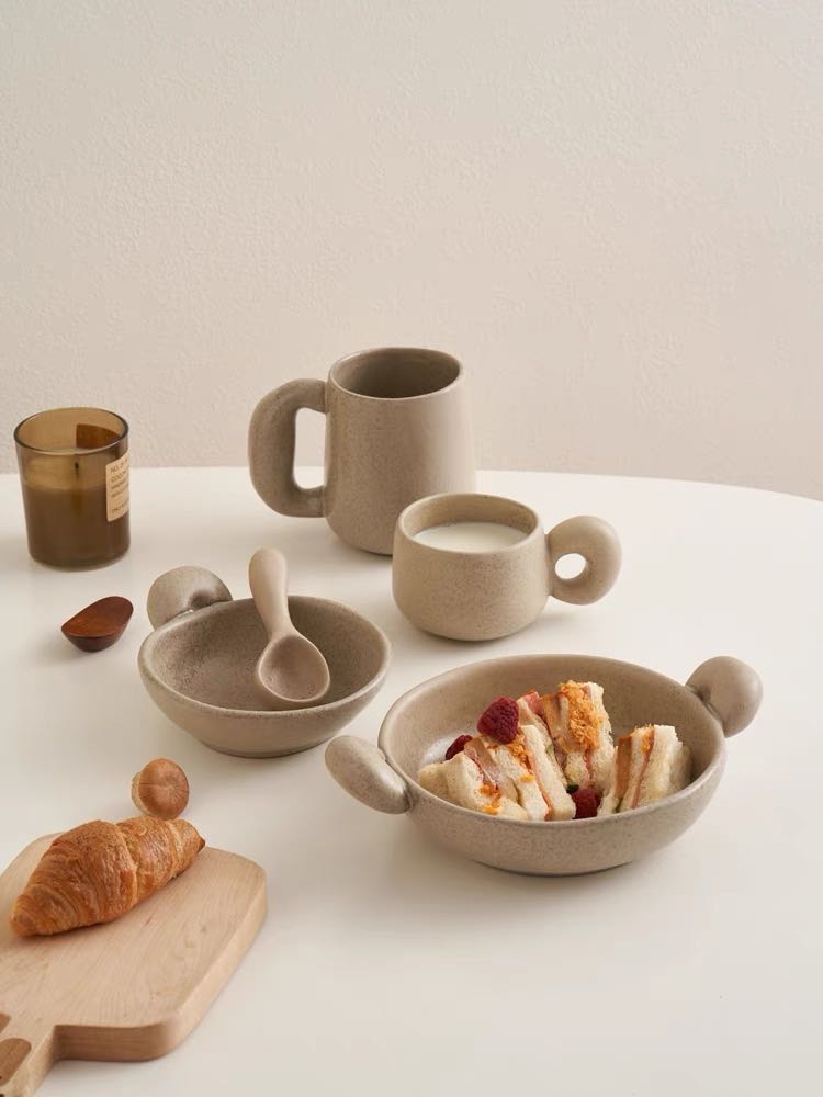 Big-ears Ceramic Pasta Bowl featuring playful design with rounded shapes and big ears, handcrafted in sandy and glacier colors.