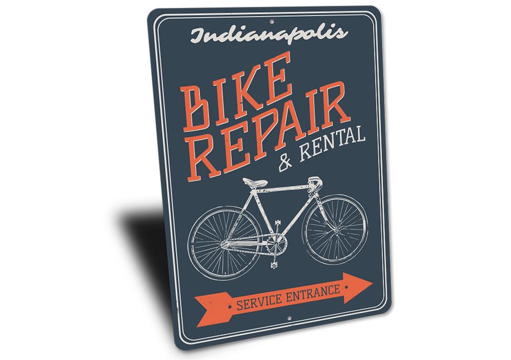 Customizable Bike Repair Sign made of durable aluminum, featuring pre-drilled holes for easy mounting.