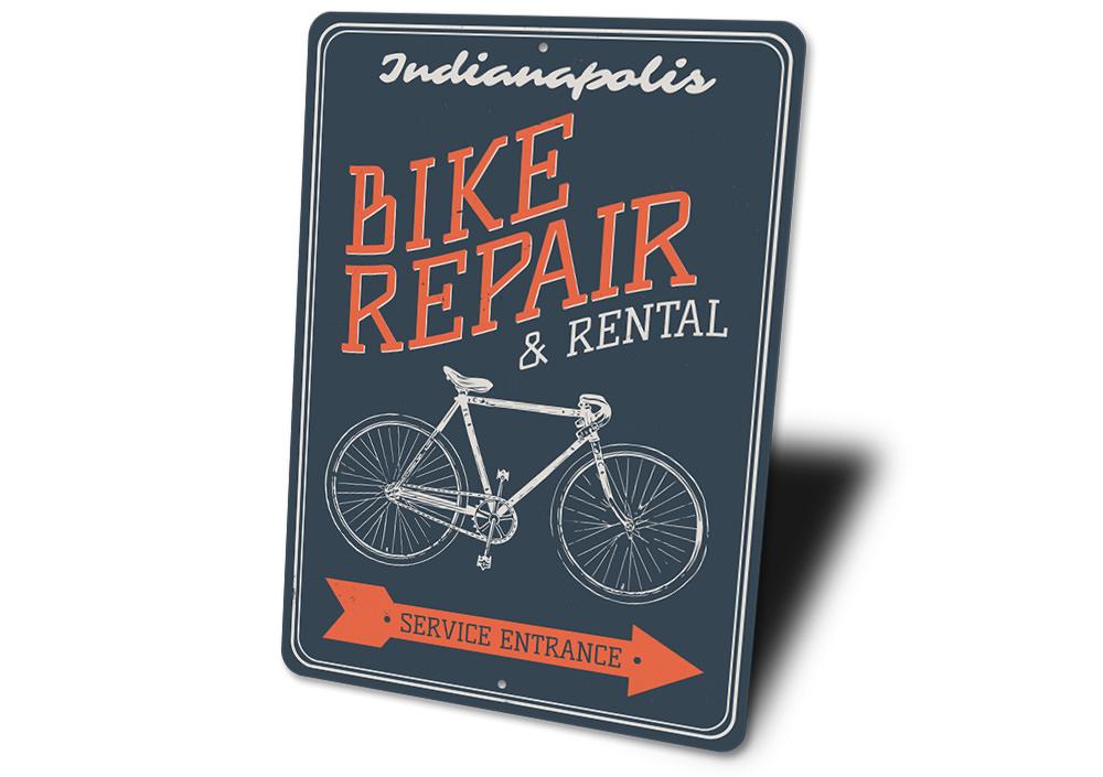 Customizable Bike Repair Sign made of durable aluminum, featuring pre-drilled holes for easy mounting.