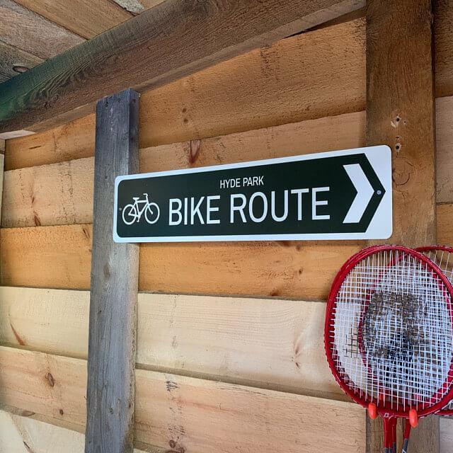 Customizable Bike Route Sign made from high-quality aluminum, featuring pre-drilled holes for easy mounting.