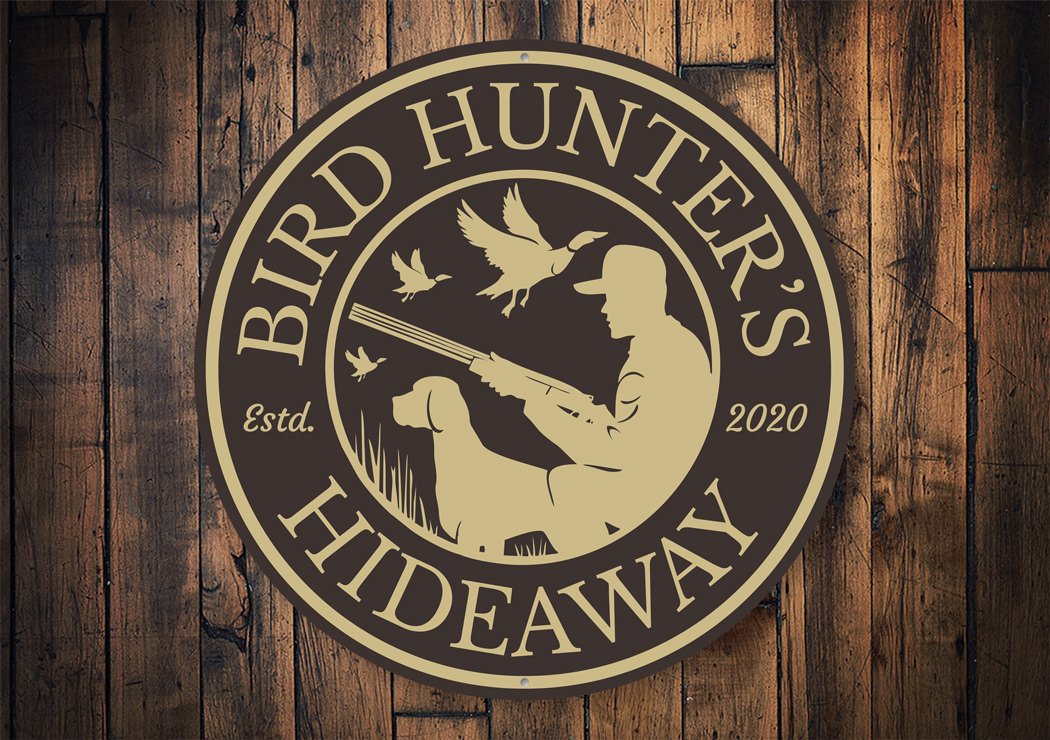 Bird Hunter's Hideaway Cabin Estd. Year Sign made of high-quality aluminum, featuring customizable text and pre-drilled holes for easy mounting.