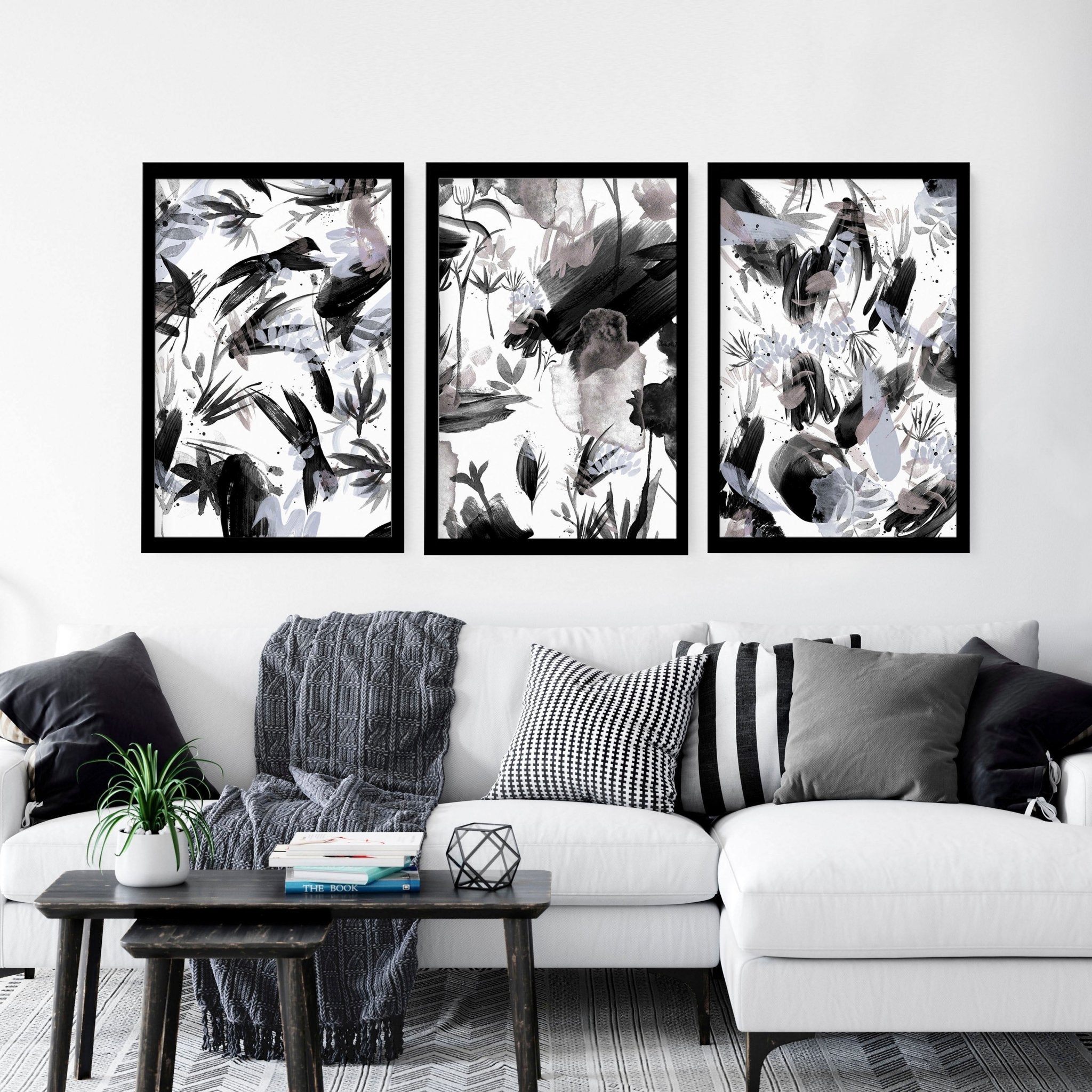 Set of 3 black and white wall art prints featuring brush strokes and abstract nature textures, perfect for modern home decor.