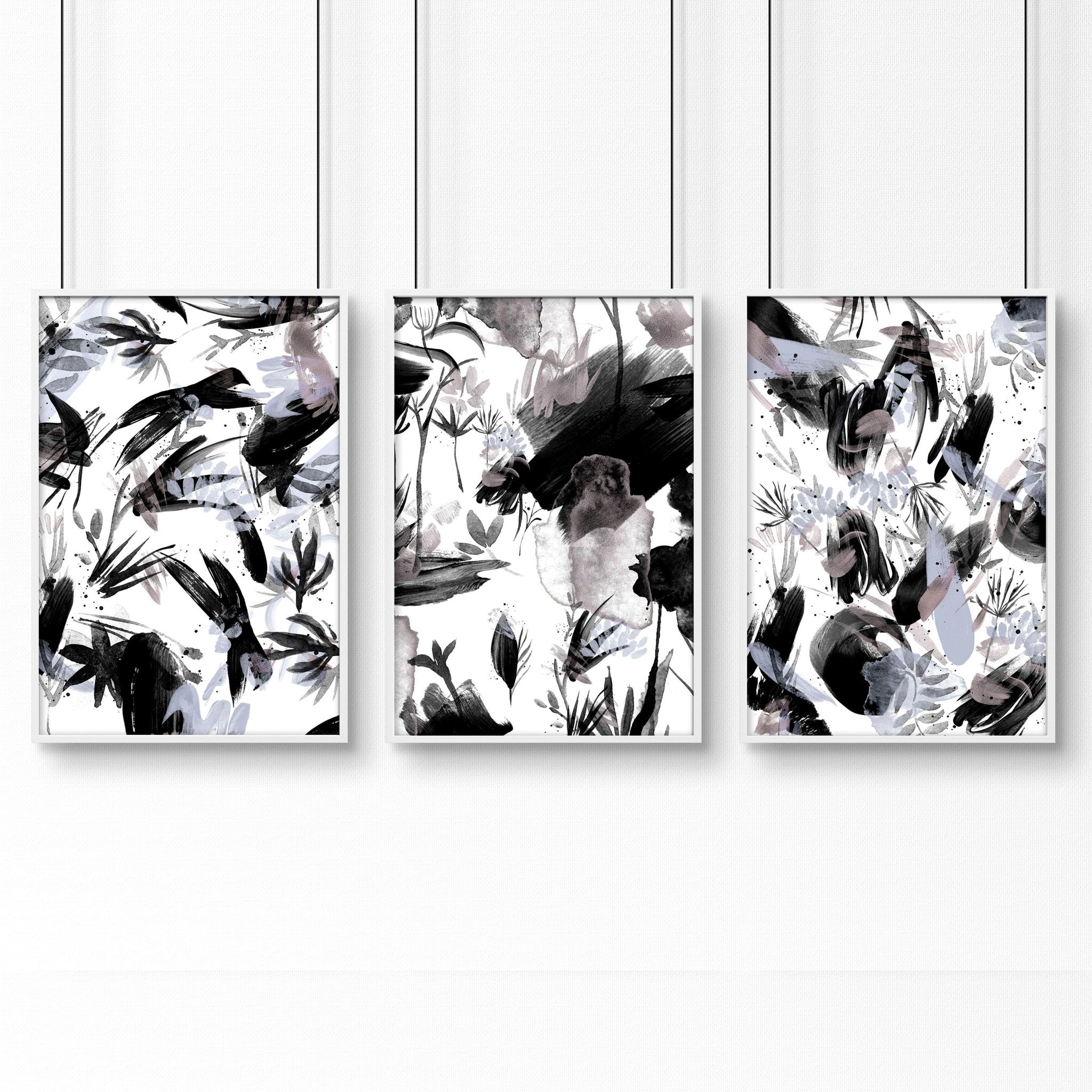 Set of 3 black and white wall art prints featuring brush strokes and abstract nature textures, perfect for modern home decor.