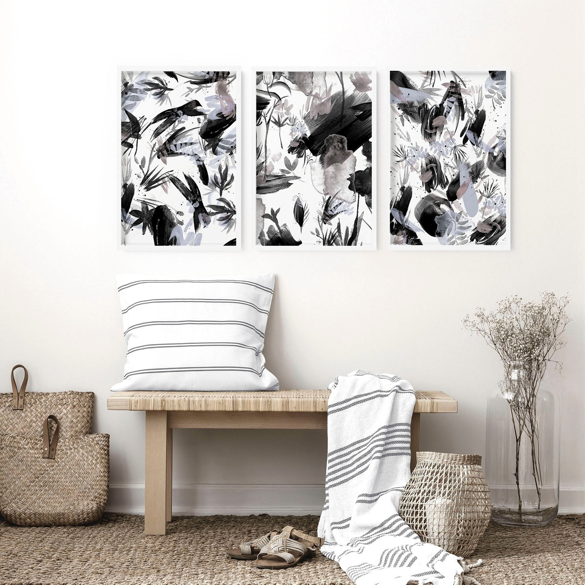 Set of 3 black and white wall art prints featuring brush strokes and abstract nature textures, perfect for modern home decor.