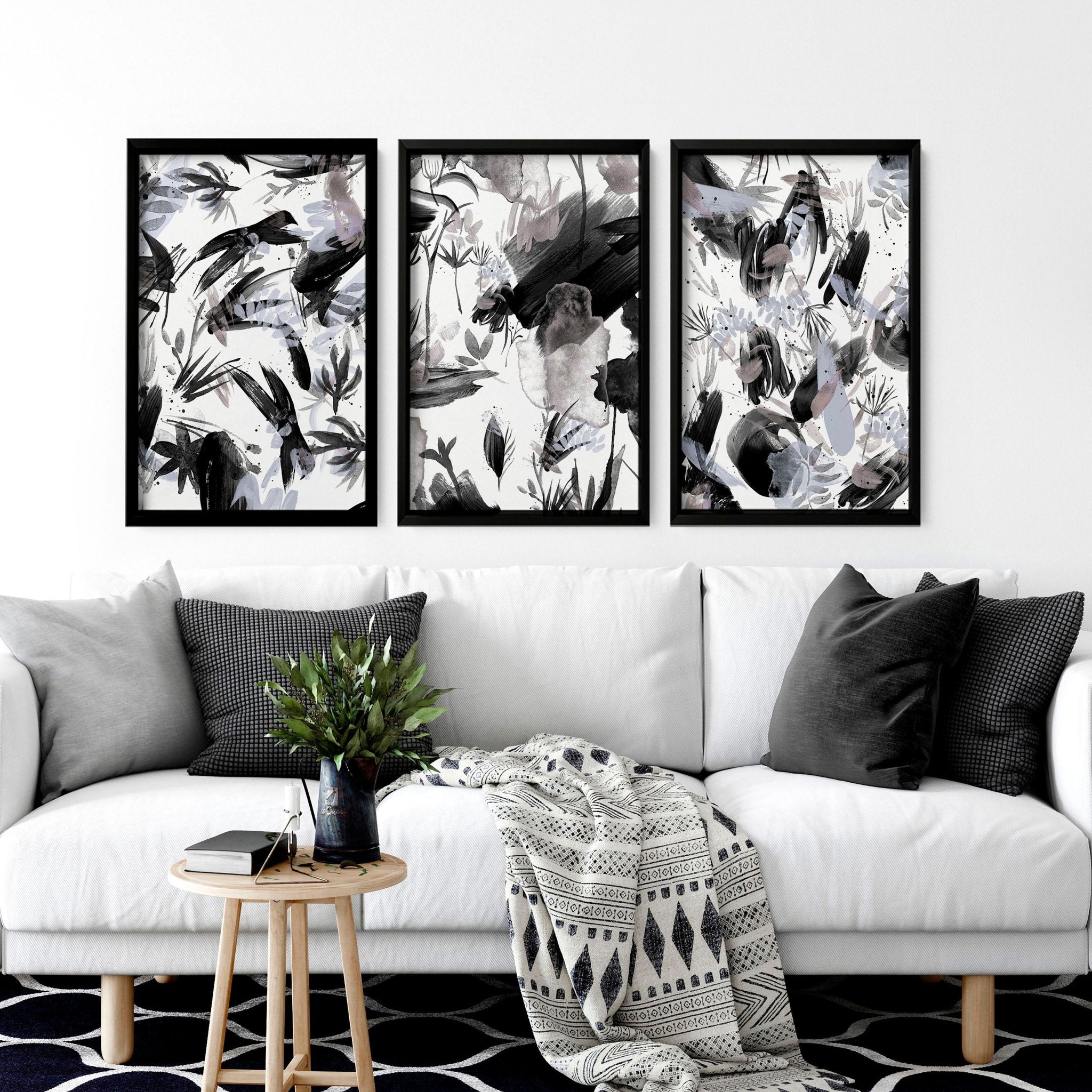 Set of 3 black and white wall art prints featuring brush strokes and abstract nature textures, perfect for modern home decor.