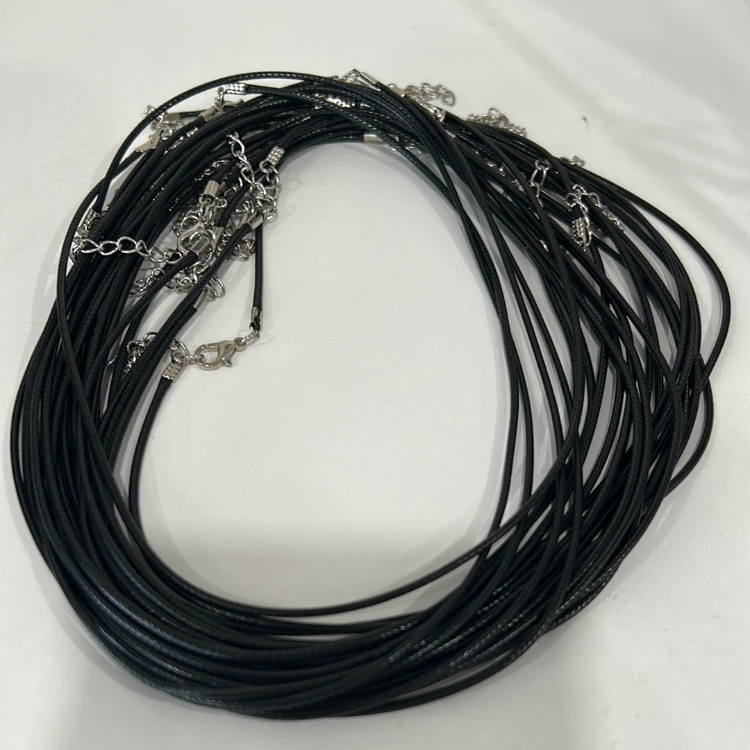 A stylish Black Cord Necklace featuring intuitively chosen crystals, symbolizing love and positive energy.